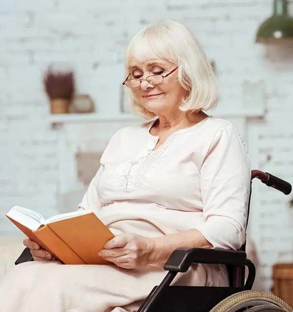 Disabled woman reading a book